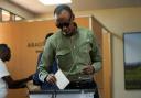 Rwanda’s President Paul Kagame casts his vote in Kigali (Brian Inganga/AP)