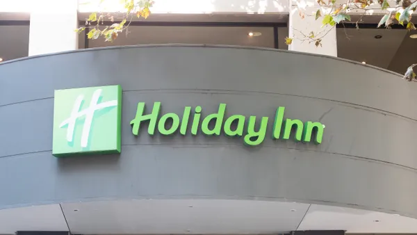 A closeup of the Holiday Inn logo on a building.