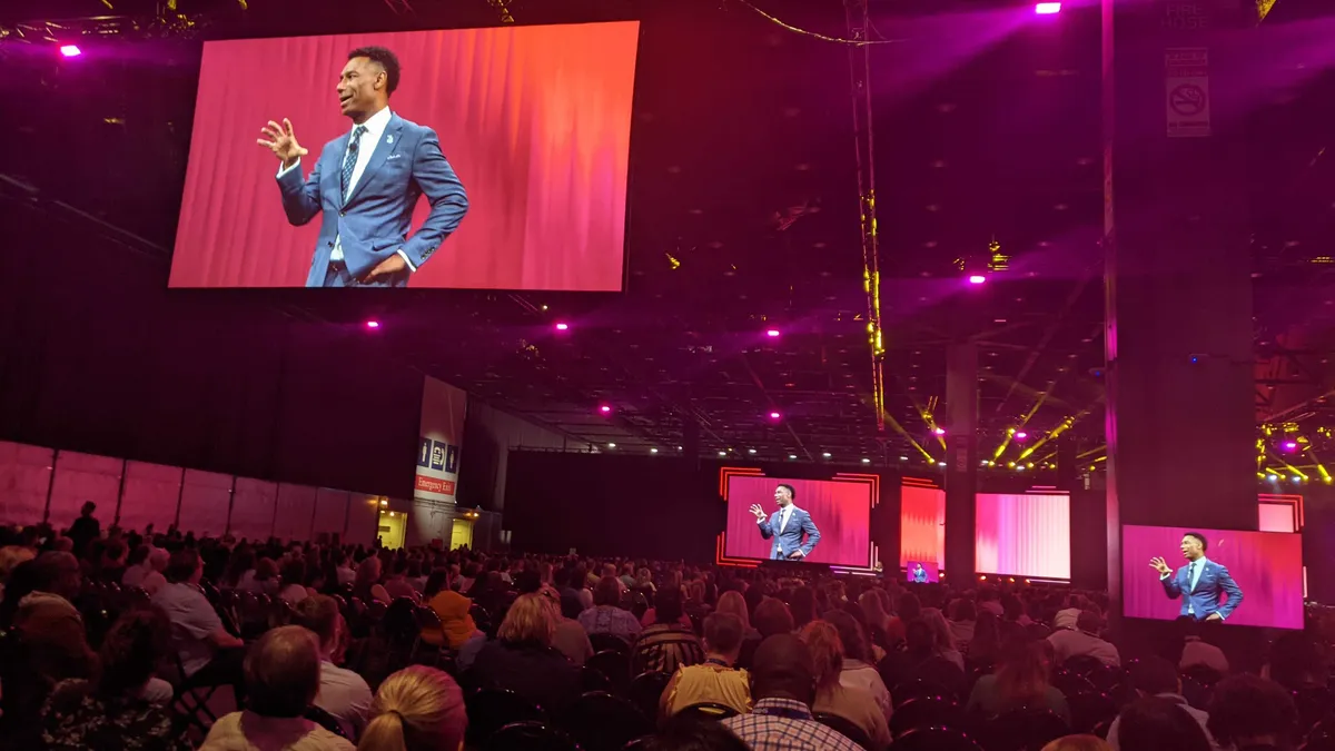 Johnny C. Taylor speaks during a SHRM conference.