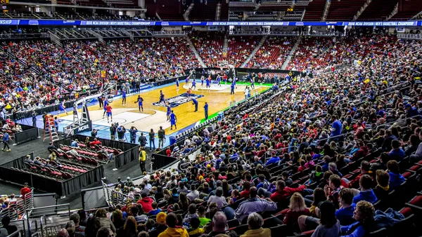 Fans watch NCAA March Madness basketball players