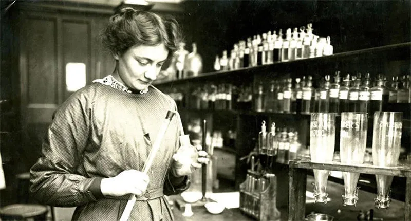 Historical image of woman in a lab