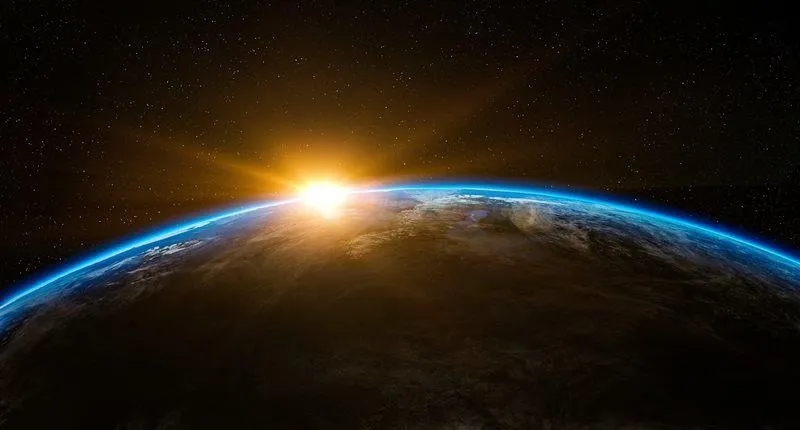 Sun rising over the Earth