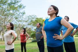 Group of women doing tai chi in the park