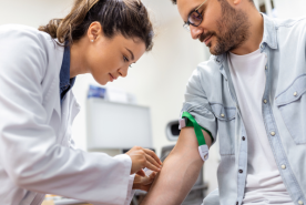 Patient with a doctor - checking the body's pH