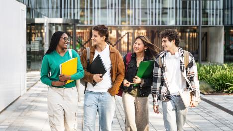 Group of students walking together on campus