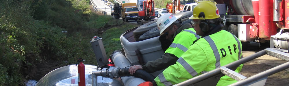 DEP Responders working on a Spill Cleanup