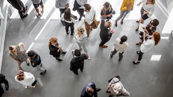 People speaking during a conference event.