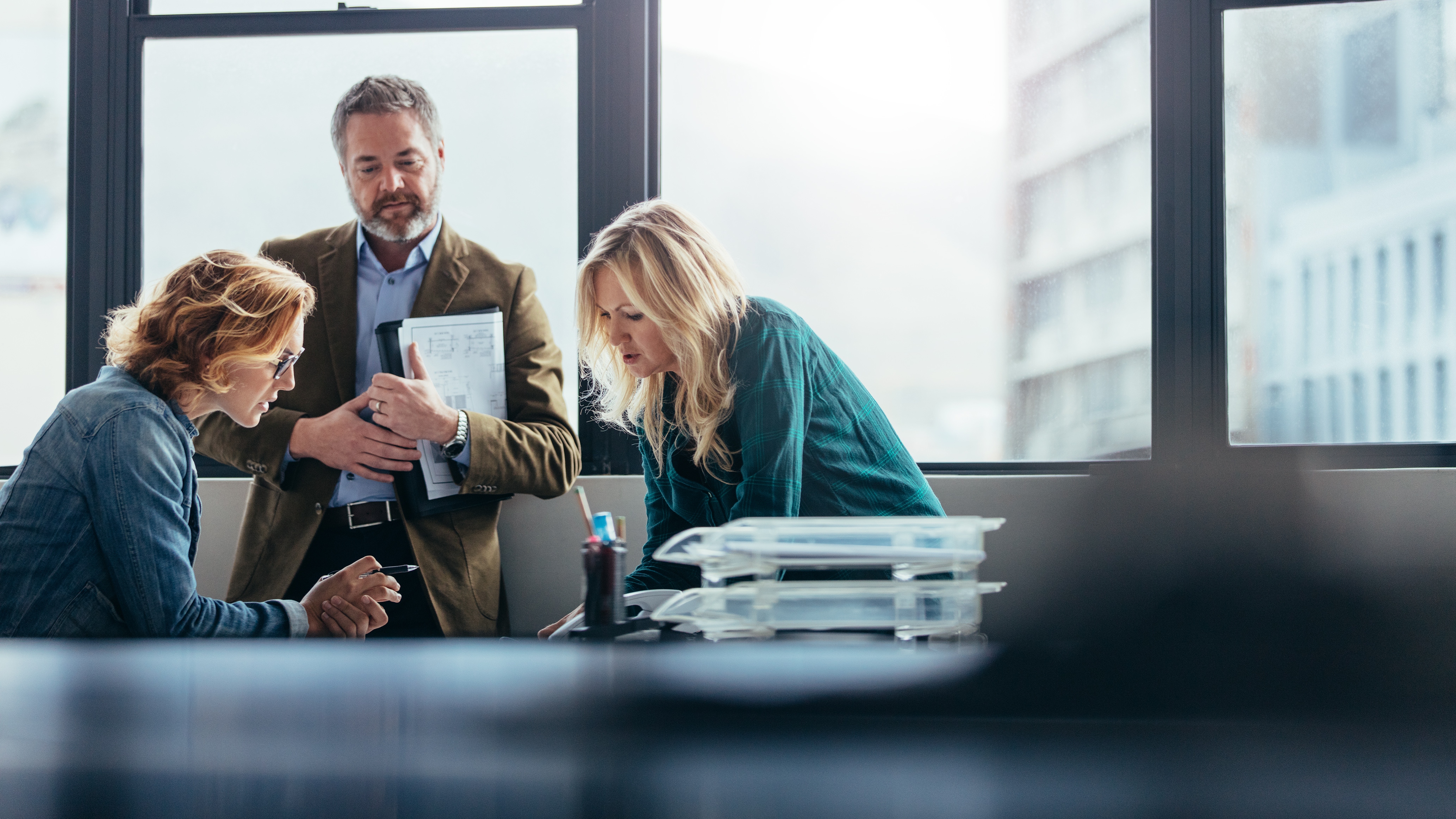 Businesspeople discussing a project