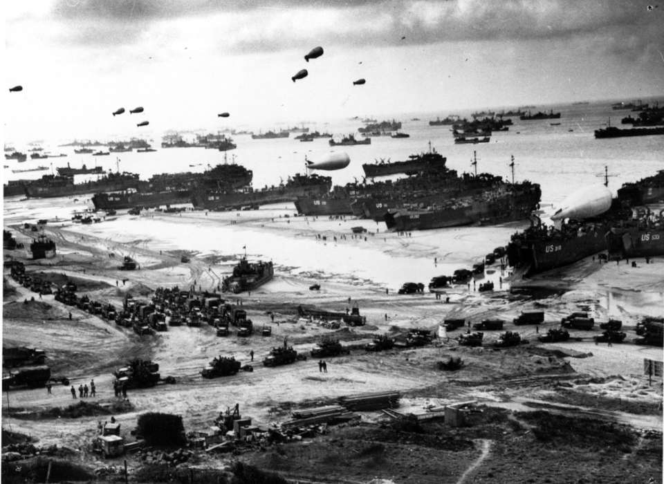 Landing ships putting cargo ashore on one of the invasion beaches