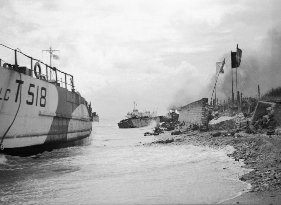 Wrecked landing craft on Nan Red beach, Juno area