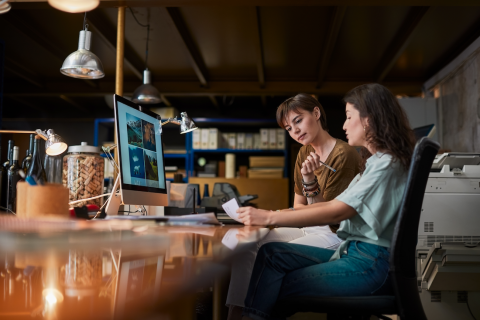 Women working in an office on a computer