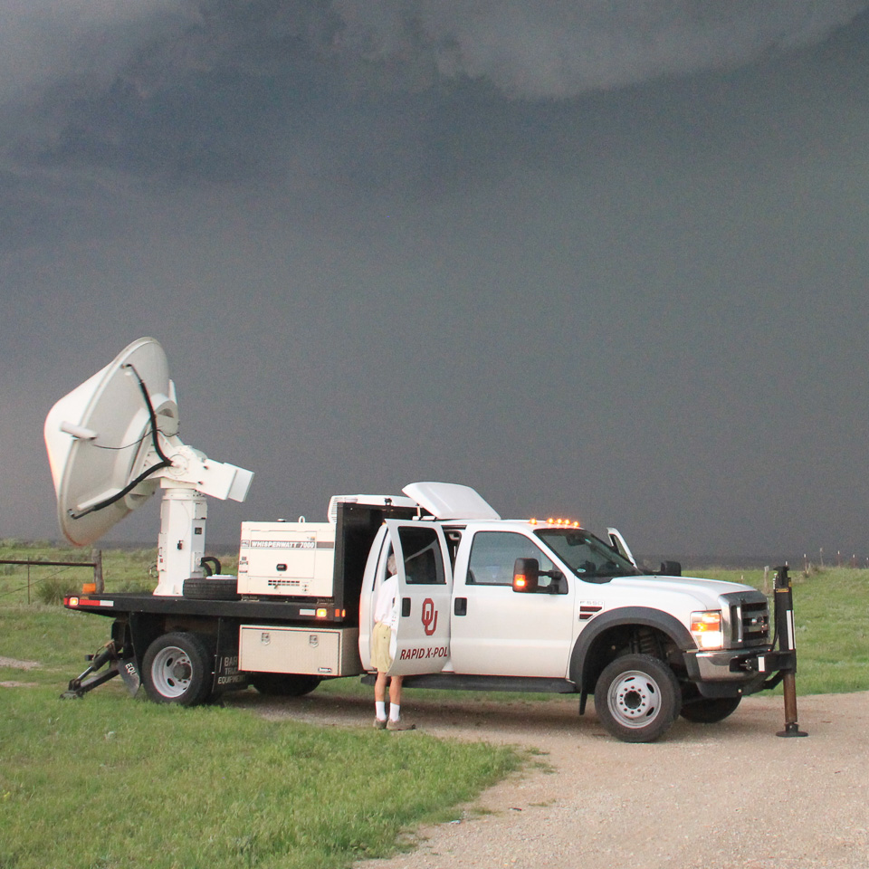 radar mounted on truck, parked by a rural road