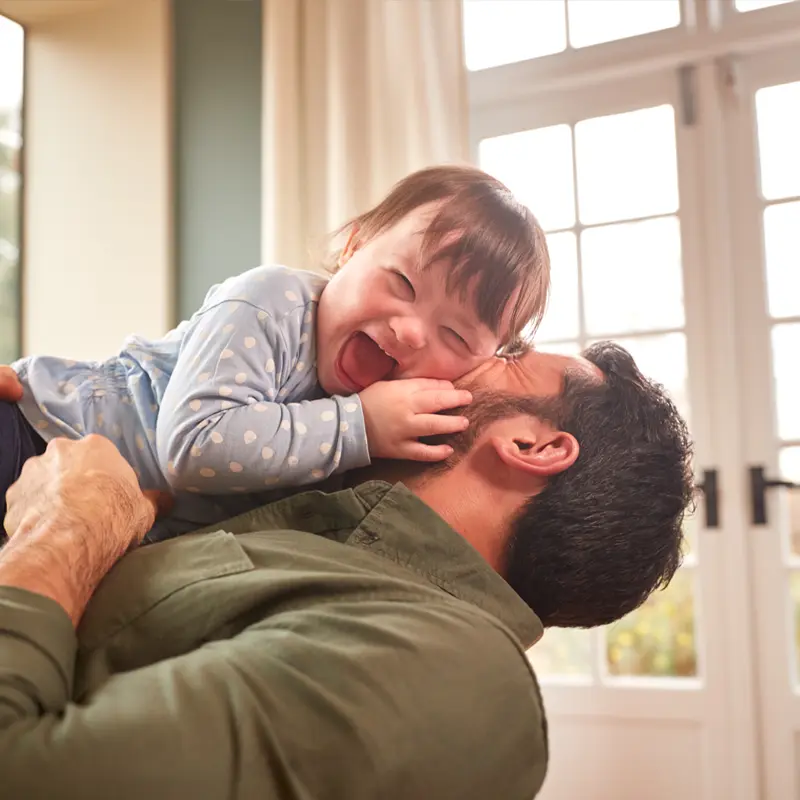 Man holding a toddler