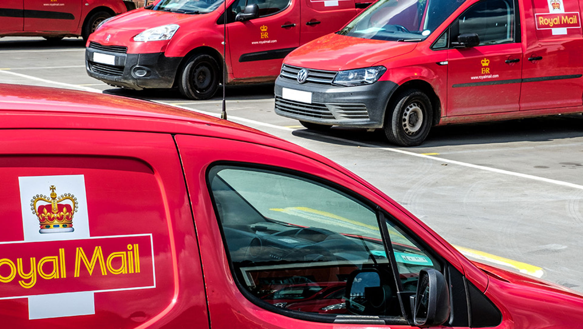 royal-mail-post-office-delivery-vans-parked