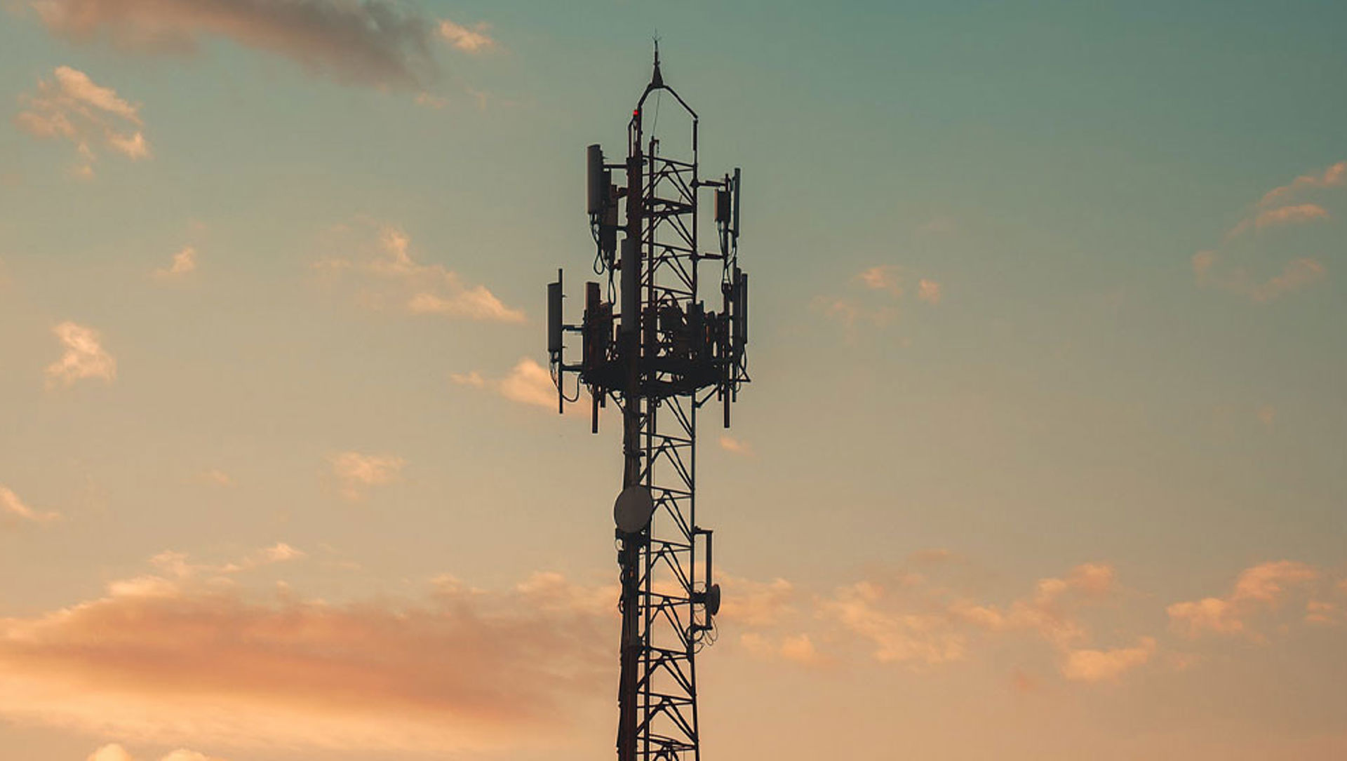 A mobile mast with sunrise in background