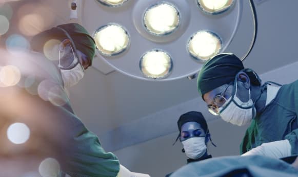 surgeons preparing for surgery