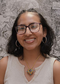 Yenni Gonzalez headshot white shirt