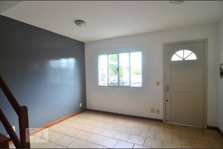 Sala de casa de condomínio à venda com 3 quartos, 78m² em Marechal Rondon, Canoas