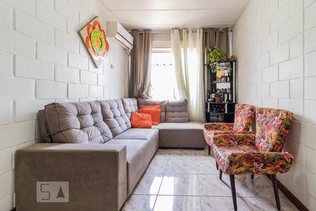 Sala de apartamento à venda com 2 quartos, 58m² em Vila Nova, Porto Alegre