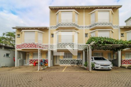 Fachada de casa de condomínio à venda com 3 quartos, 155m² em Marechal Rondon, Canoas