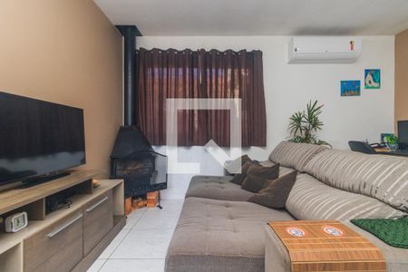 Sala de casa de condomínio à venda com 2 quartos, 125m² em Olaria, Canoas