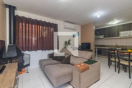 Sala de casa de condomínio à venda com 2 quartos, 125m² em Olaria, Canoas