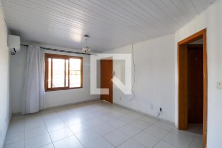 Sala de casa de condomínio à venda com 2 quartos, 75m² em Olaria, Canoas