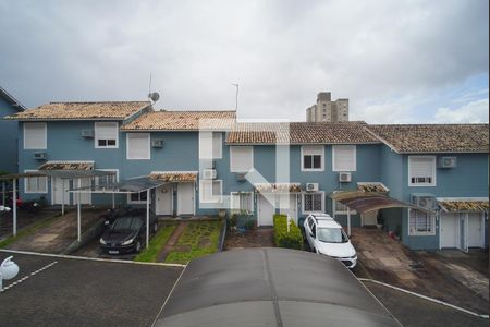 Quarto 1 - Vista de casa de condomínio à venda com 2 quartos, 79m² em Morro Santana, Porto Alegre