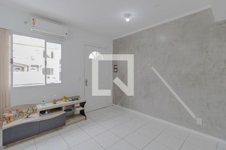 Sala de casa de condomínio à venda com 2 quartos, 79m² em Marechal Rondon, Canoas