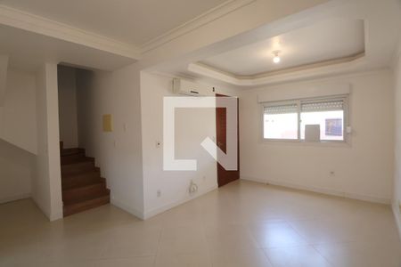 Sala de casa de condomínio à venda com 3 quartos, 110m² em Harmonia, Canoas