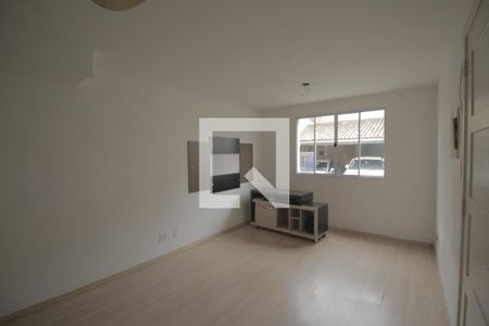 Sala de casa de condomínio à venda com 4 quartos, 107m² em Humaitá, Porto Alegre