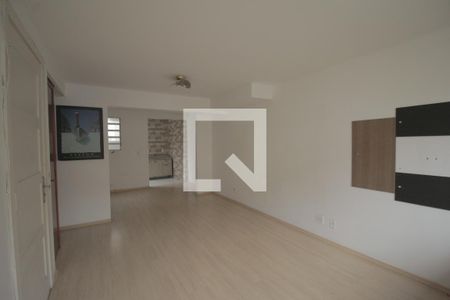 Sala de casa de condomínio à venda com 4 quartos, 107m² em Humaitá, Porto Alegre