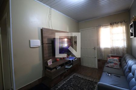 Sala de casa de condomínio à venda com 2 quartos, 48m² em São José, Canoas