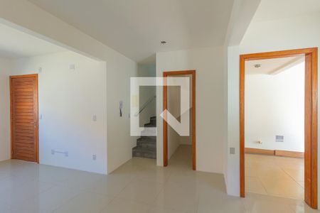 Sala de casa de condomínio à venda com 3 quartos, 89m² em Harmonia, Canoas