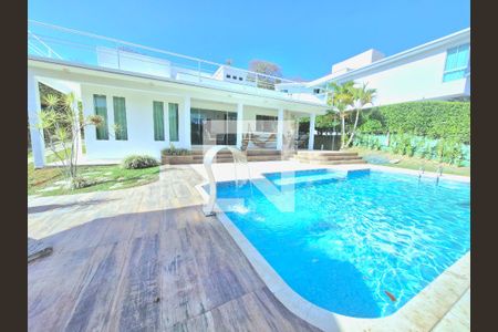 Piscina e fachada de casa à venda com 5 quartos, 368m² em Condados da Lagoa, Lagoa Santa