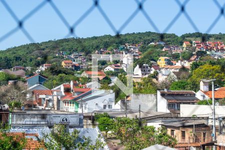 Vista da sala  de apartamento à venda com 3 quartos, 77m² em Camaquã, Porto Alegre