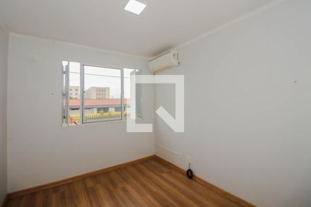 Quarto 1 de casa de condomínio à venda com 2 quartos, 101m² em Sarandi, Porto Alegre