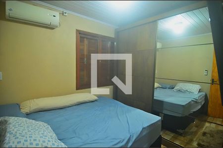 Quarto 2 de casa à venda com 2 quartos, 70m² em Guajuviras, Canoas