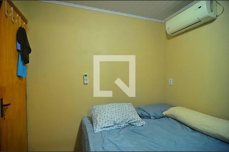 Quarto 2 de casa à venda com 2 quartos, 70m² em Guajuviras, Canoas