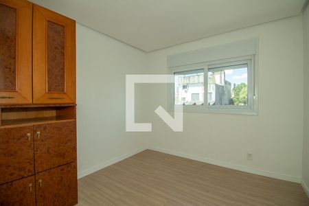 Quarto 2 de apartamento para alugar com 2 quartos, 64m² em Vila Ipiranga, Porto Alegre