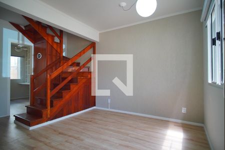 Sala de casa de condomínio à venda com 3 quartos, 104m² em Humaitá, Porto Alegre