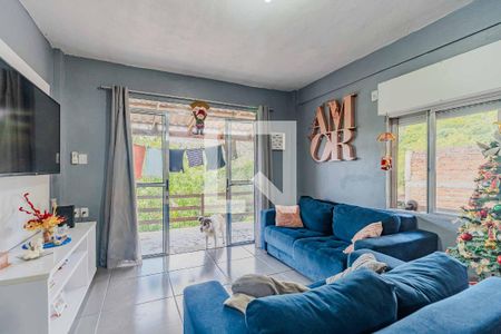 Sala de casa à venda com 4 quartos, 112m² em Vila Nova, Porto Alegre