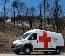 emergency response vehicle approaches wildfire area