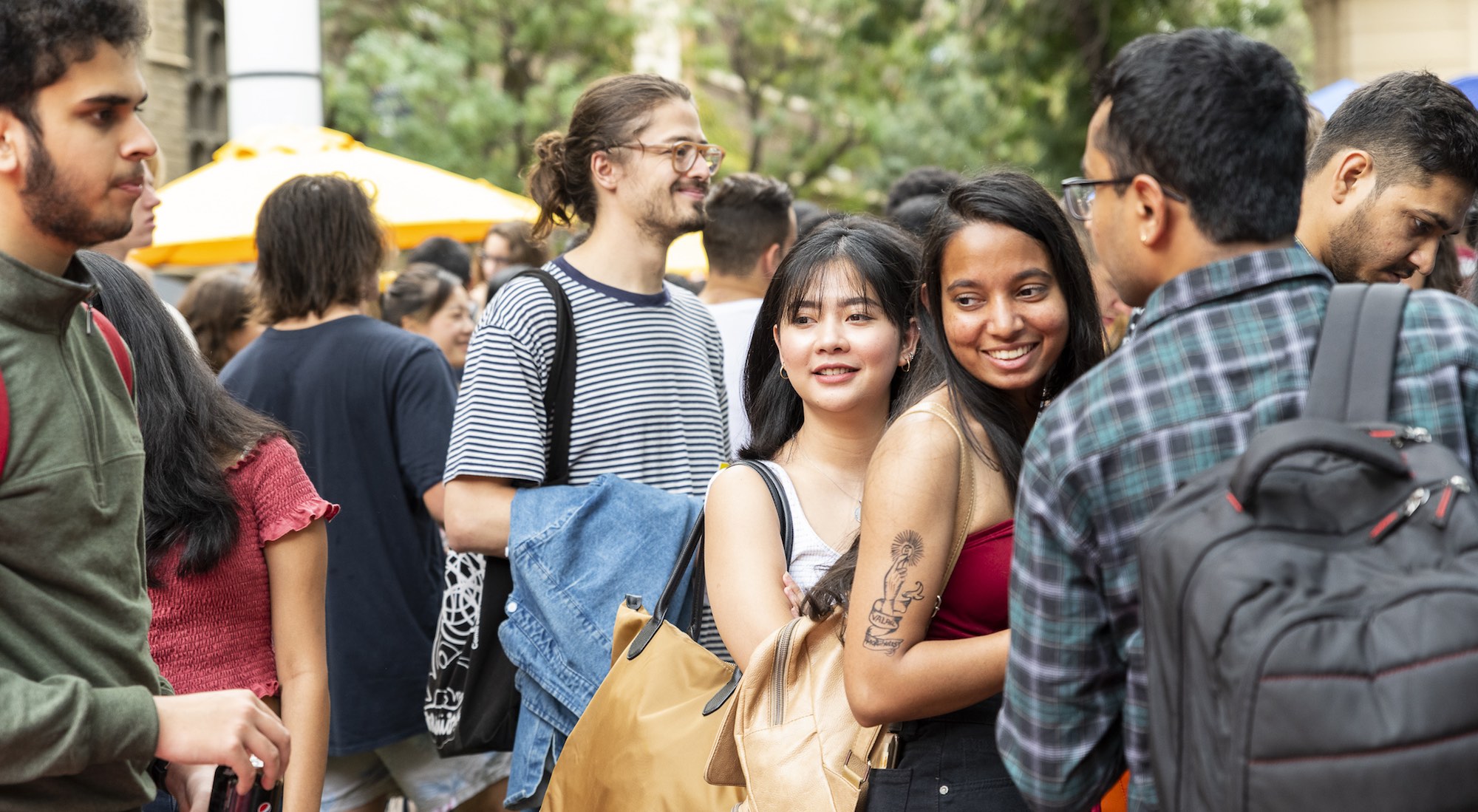 Students gather at an event at the City Campus.