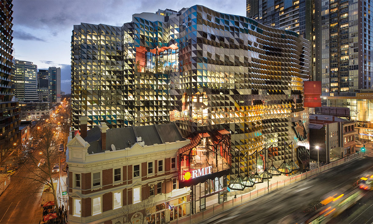 Swanston academic building exterior at night