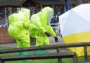 Emergency services in hazmat suits put an incident tent around the bench in the Maltings, Salisbury where the Skripals collapsed after being poisoned with Novichok in 2018. Picture: Newsquest