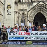 Protesters outside the Royal Courts of Justice in London