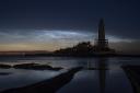 Noctilucent clouds or night clouds over St Mary’s Lighthouse in Whitley Bay, North Tyneside (Owen Humphreys/PA)