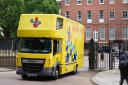 A yellow removal van was spotted at the back of Downing Street, with workers steadily loading it up with items (James Manning/PA)