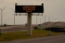 A sign notifies motorists to prepare for Beryl in Portland, Texas, on Sunday (Eric Gay/AP)